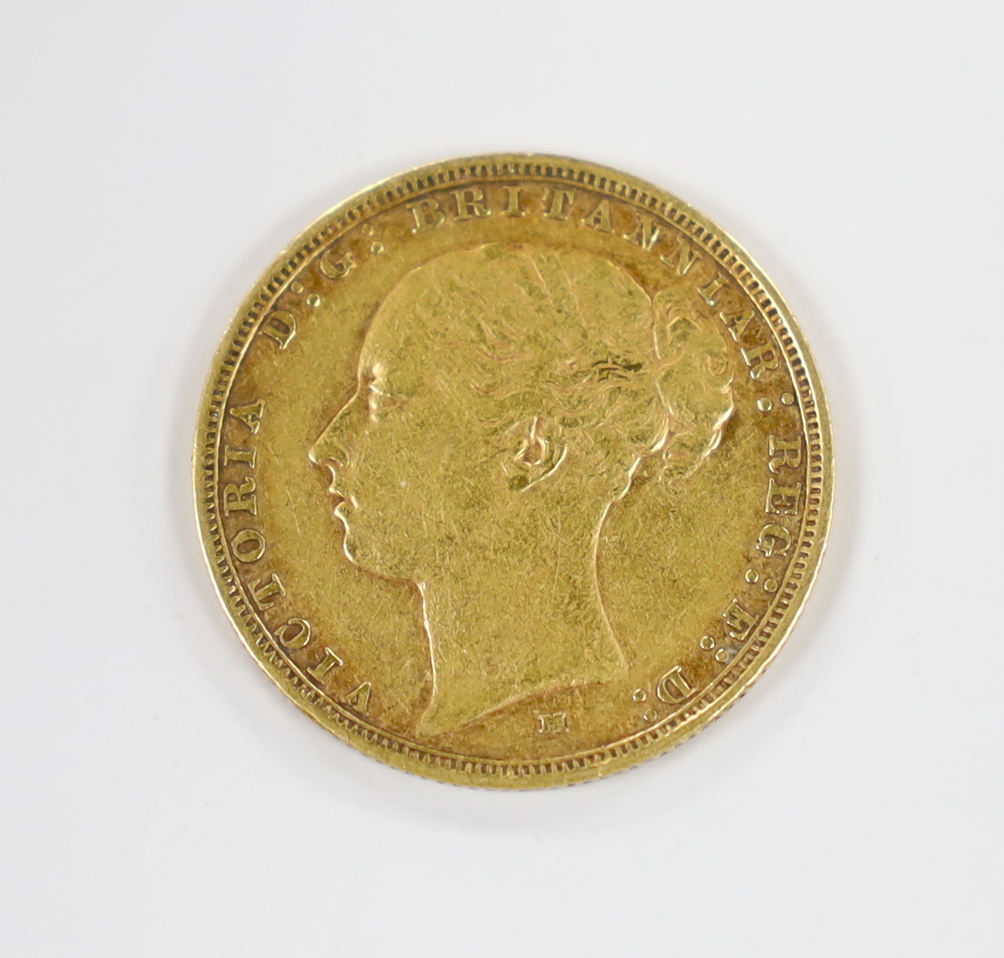 A Victorian 1885 gold sovereign.
